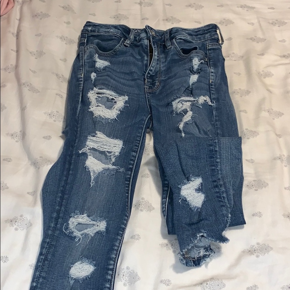 Ae jeans size 4 regular rips in front and back